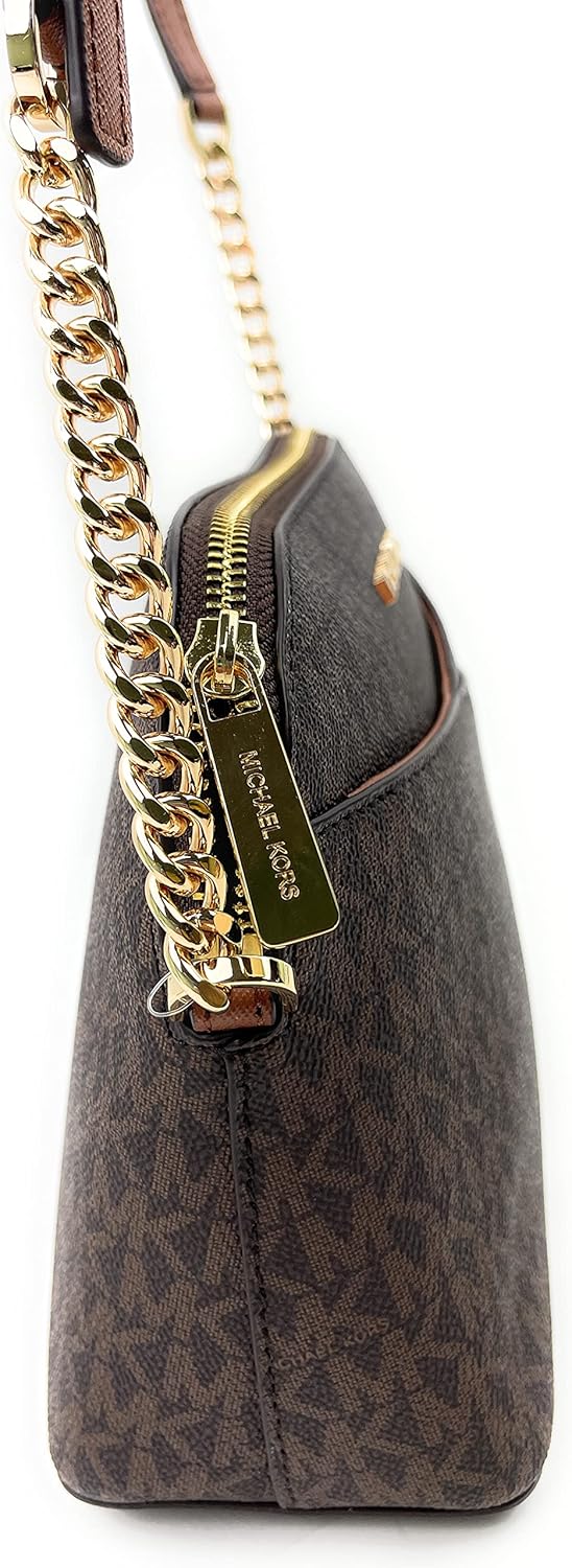 Side view of Michael Kors crossbody leather handbag with a stylish chain strap and zip closure