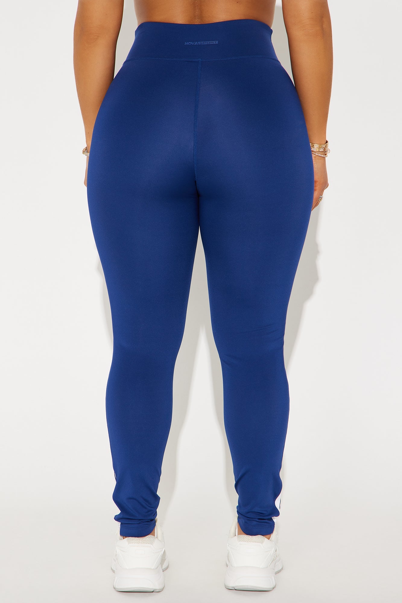 Fashion Nova midnight blue active leggings with a high waistband for comfort and flexibility