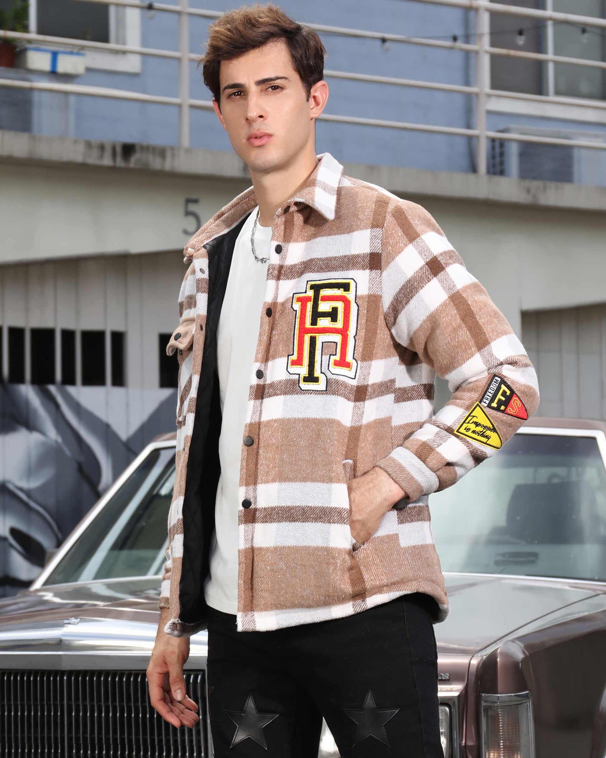 Logeqi modern plaid moto jacket in brown and white check pattern worn by male model outdoors