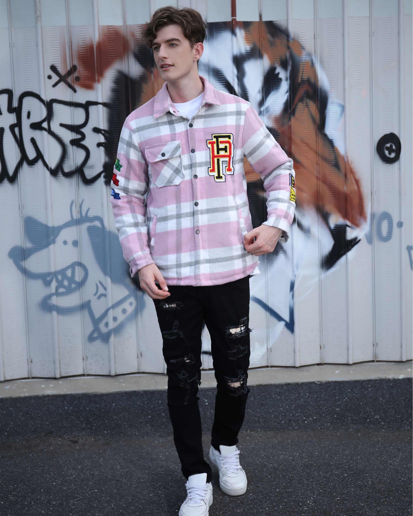 Logeqi modern plaid moto jacket in pink and white worn by male model with black ripped jeans
