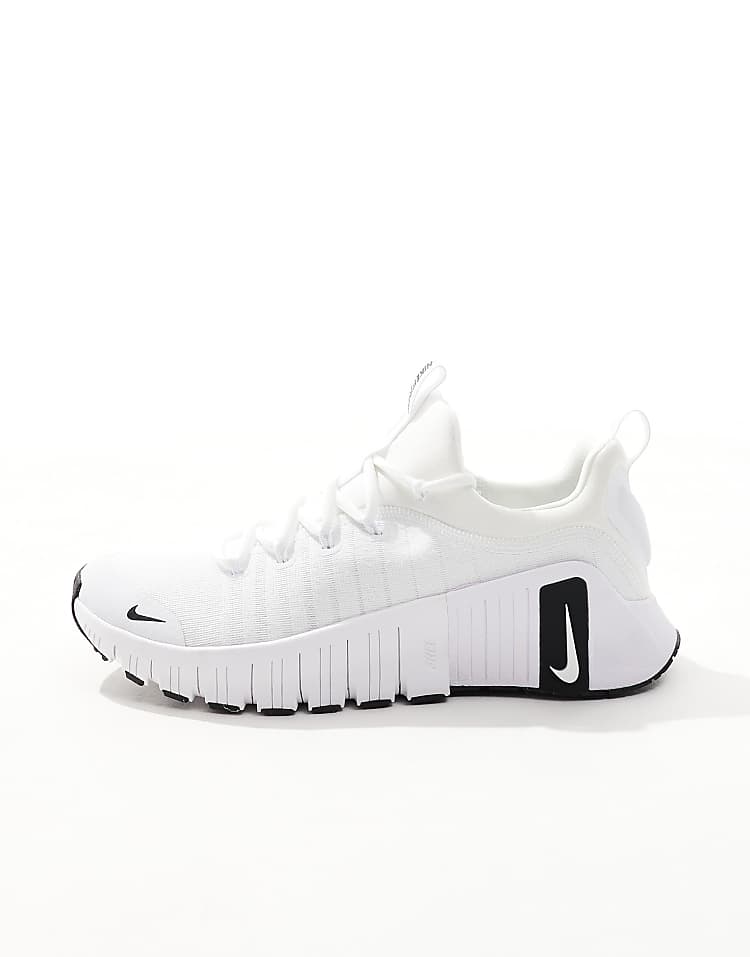 Nike Free Metcon 6 unisex sneakers in white and black with a sleek design for versatile training