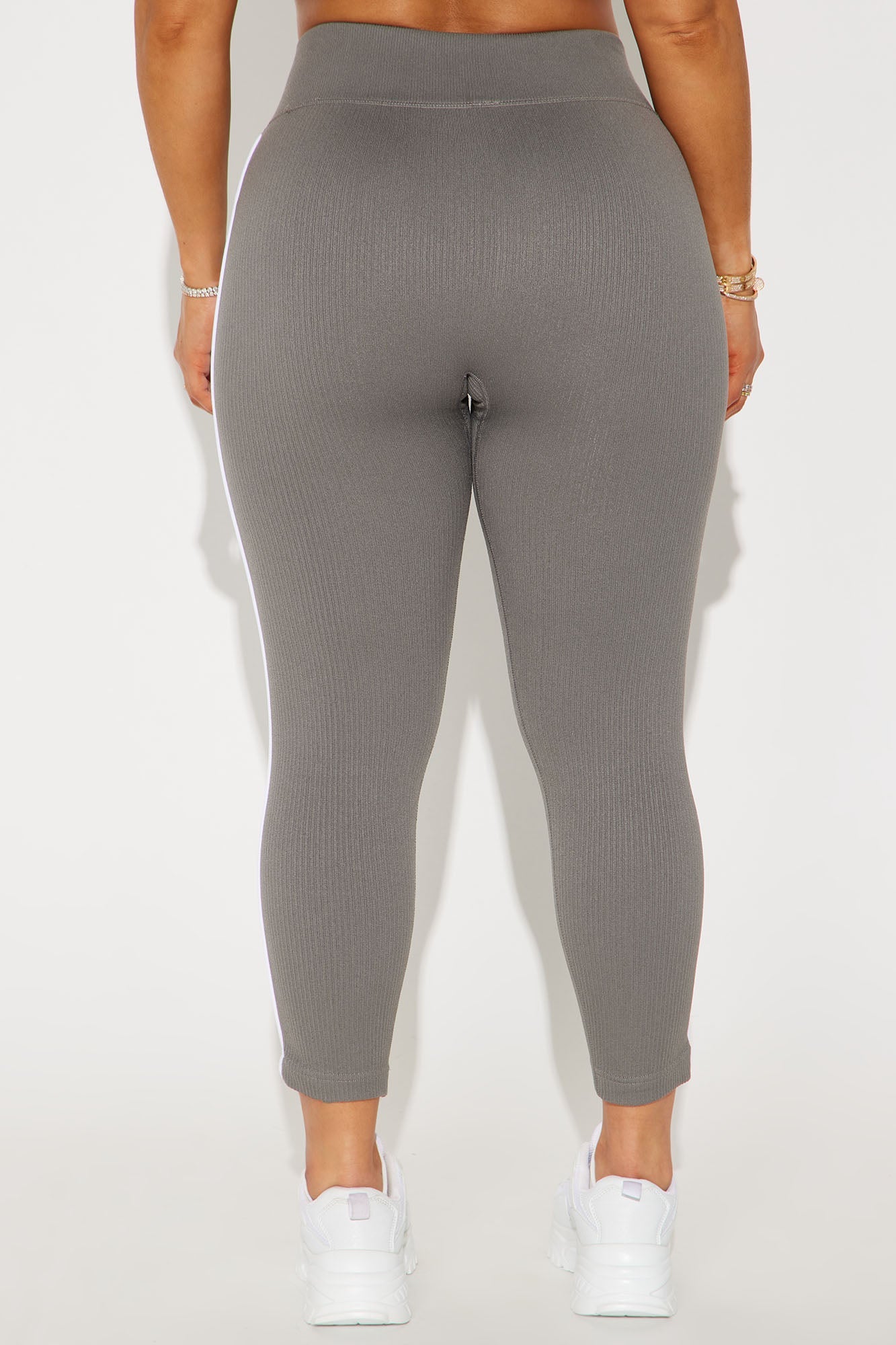 Gray seamless capri leggings for women featuring a comfortable high waistband and fitted design