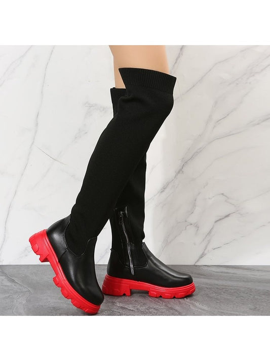 Wholesale7 patchwork over the knee boots in black with red chunky soles and side zipper