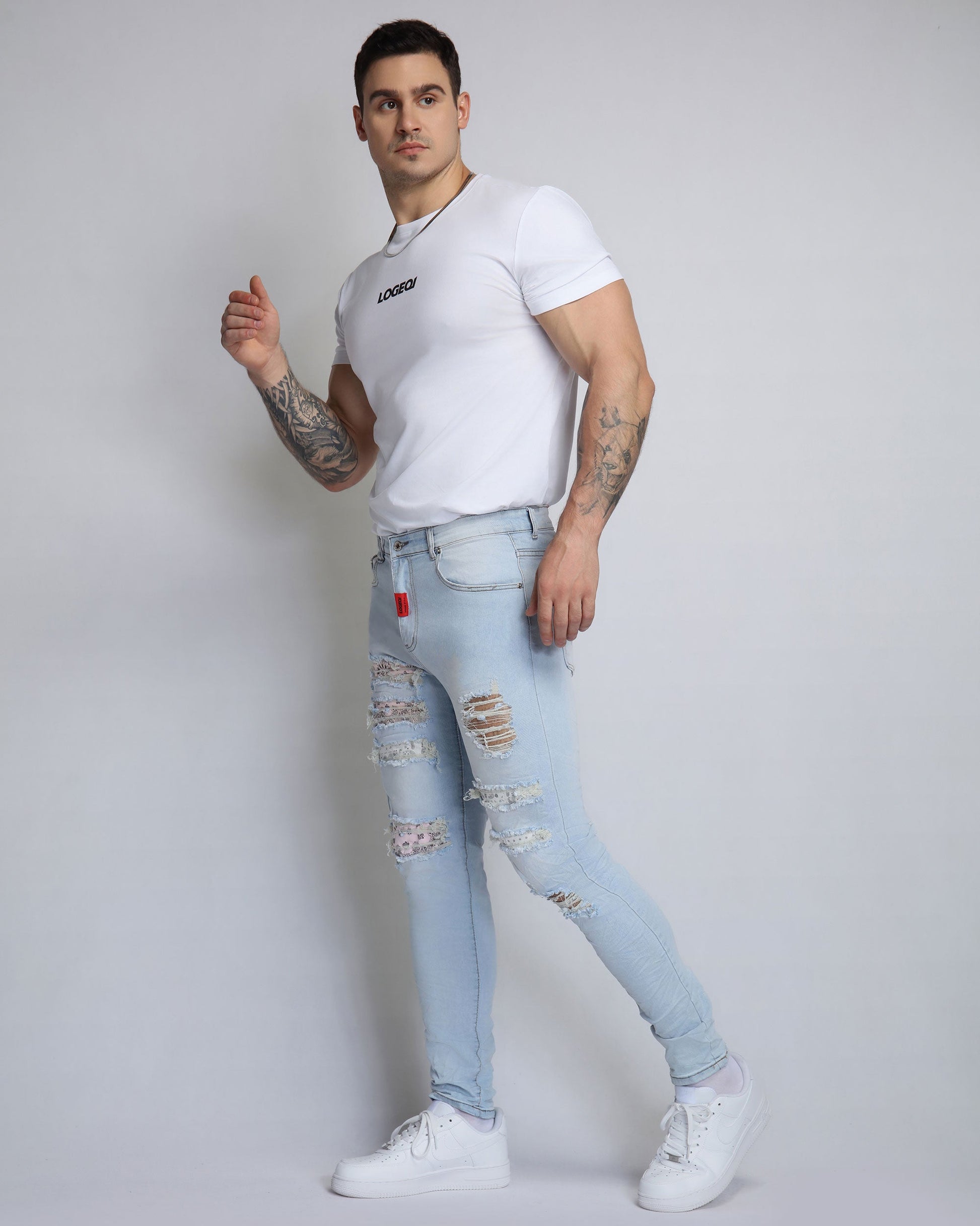 Logeqi pink cashew blossom jeans with distressed details and a slim fit for casual styles