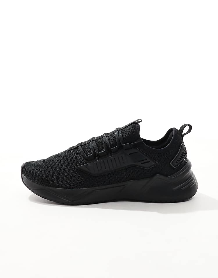 PUMA Retaliate 3 black sneakers featuring a sleek design and breathable material for comfort.