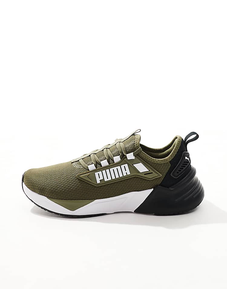 PUMA Retaliate 3 black sneakers designed for comfort and style with a sleek silhouette