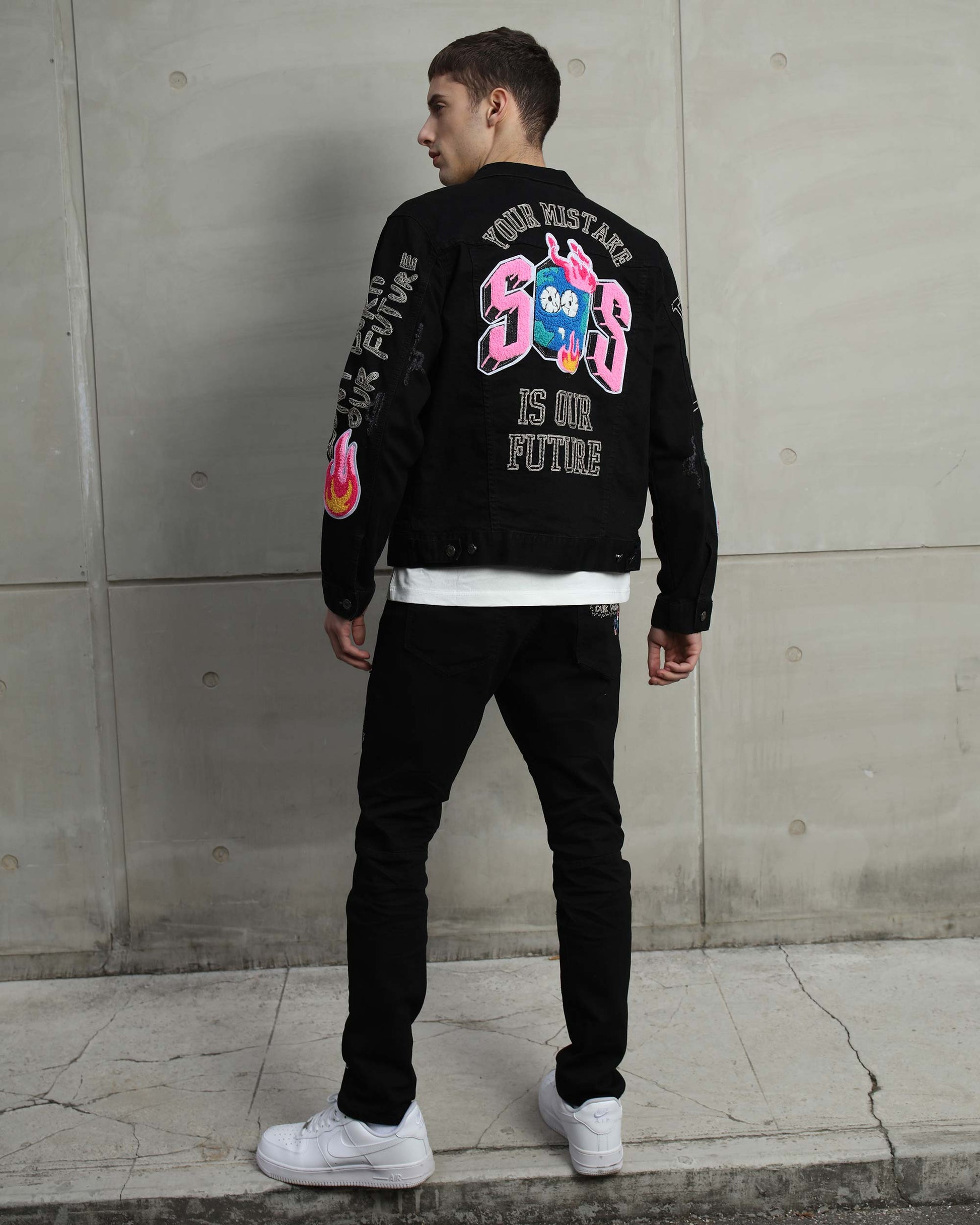 Logeqi ripped black denim jacket featuring colorful graphics on the back for a stylish look