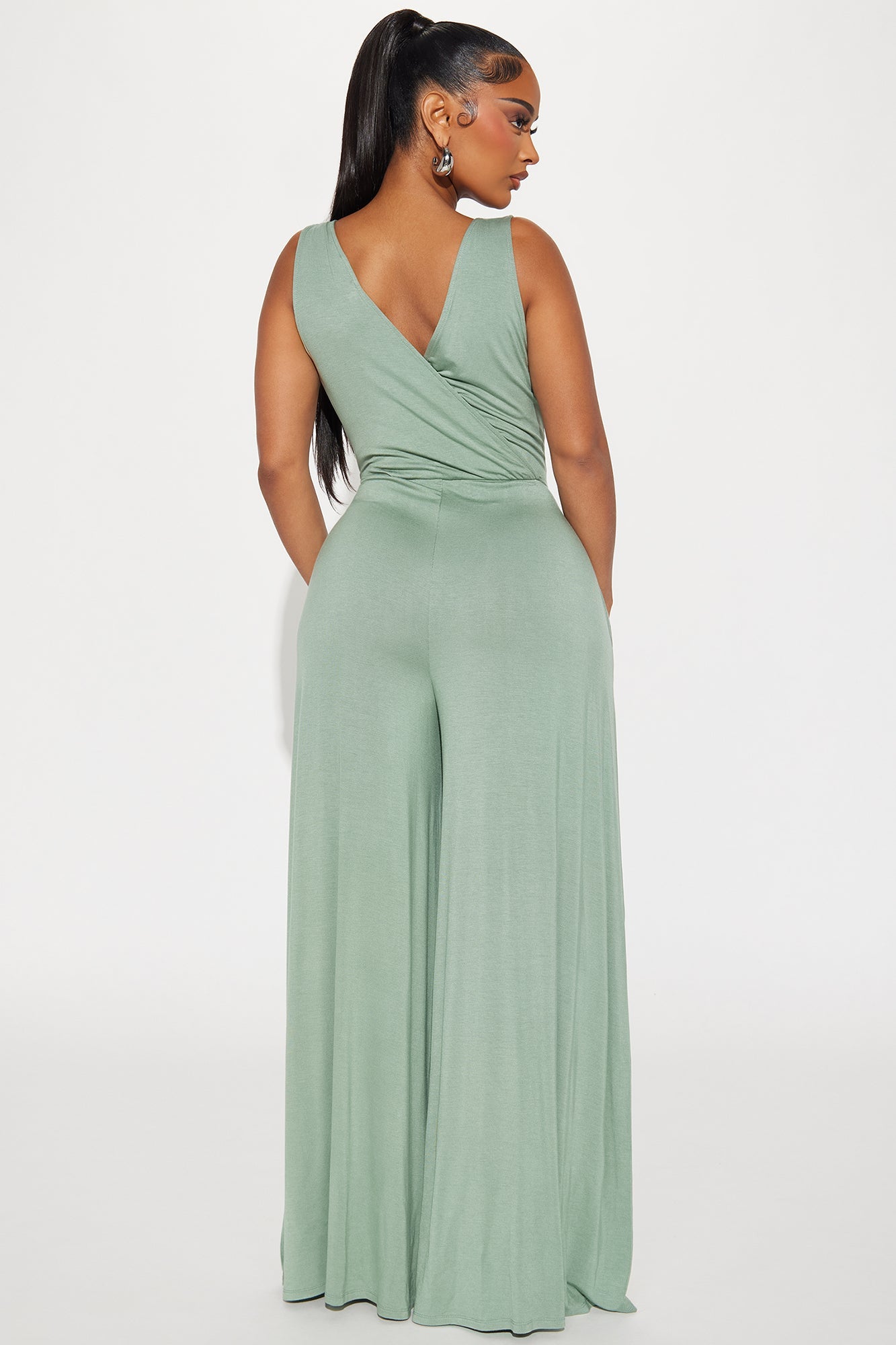 Elegant sage green jumpsuit for women with a flattering fit and wide-leg design