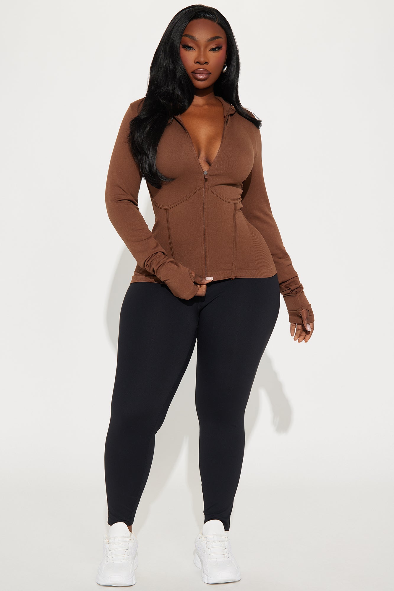 Brown seamless active jacket for women from Fashion Nova with a zip front and fitted design