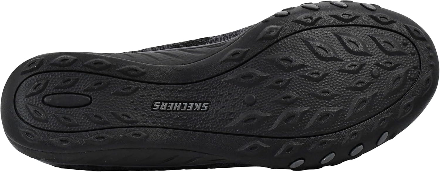 Skechers women's Breathe-Easy sneakers showing the flexible black outsole design for enhanced grip