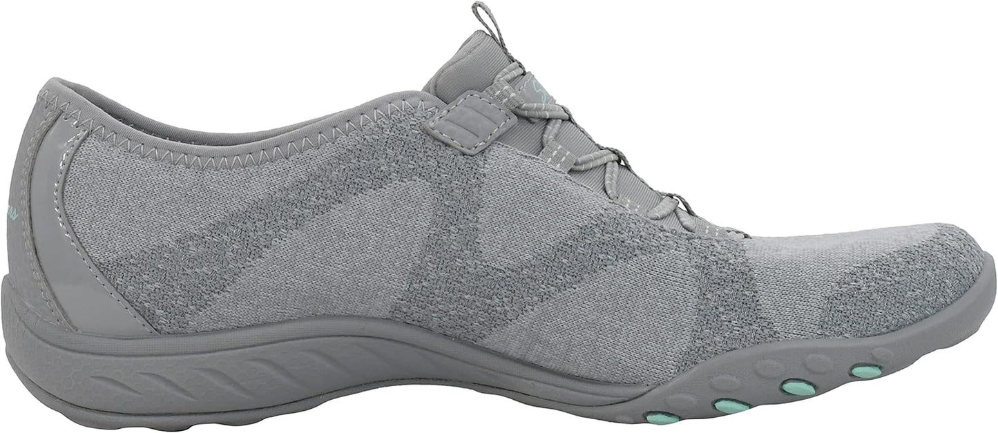 Skechers women's Breathe-Easy sneakers in gray with flexible design for comfort and style