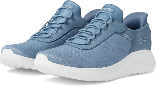Skechers women's slip-on sneakers in light blue with breathable mesh upper and soft cushioning