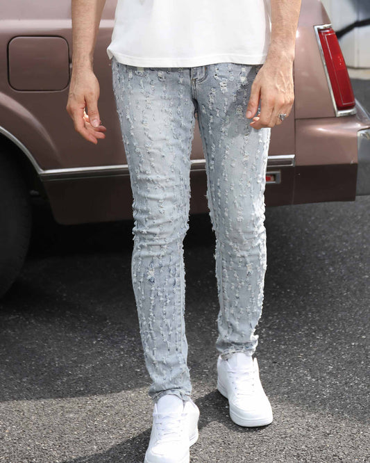 Logeqi slim fit ripped jeans in light wash with distressed details and a stylish appearance