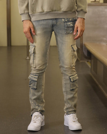 Logeqi spray painted blue cargo jeans with multiple pockets and a slim fit style