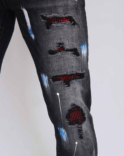 Logeqi street art jeans with distressed detailing and vibrant spray paint effects