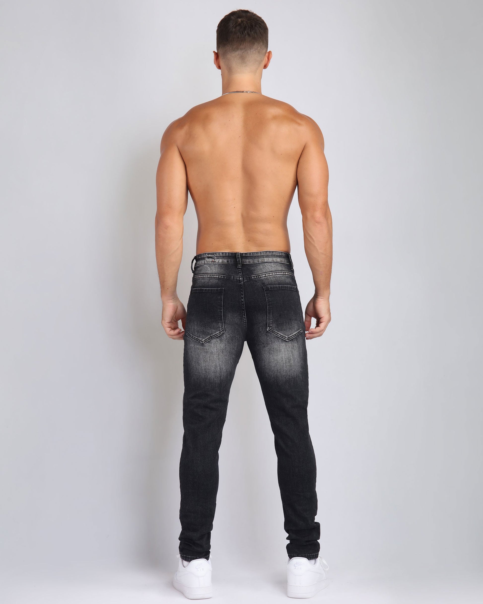 Logeqi Street Art Jeans for men with a slim fit and distressed detailing in dark wash