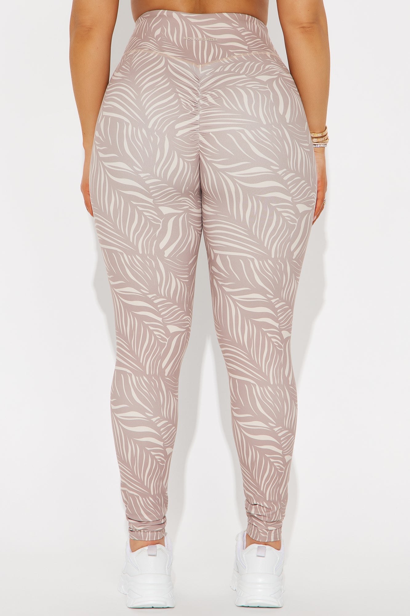 Fashion Nova Nova Sport super soft active leggings for women with a trendy leaf pattern and high-rise fit