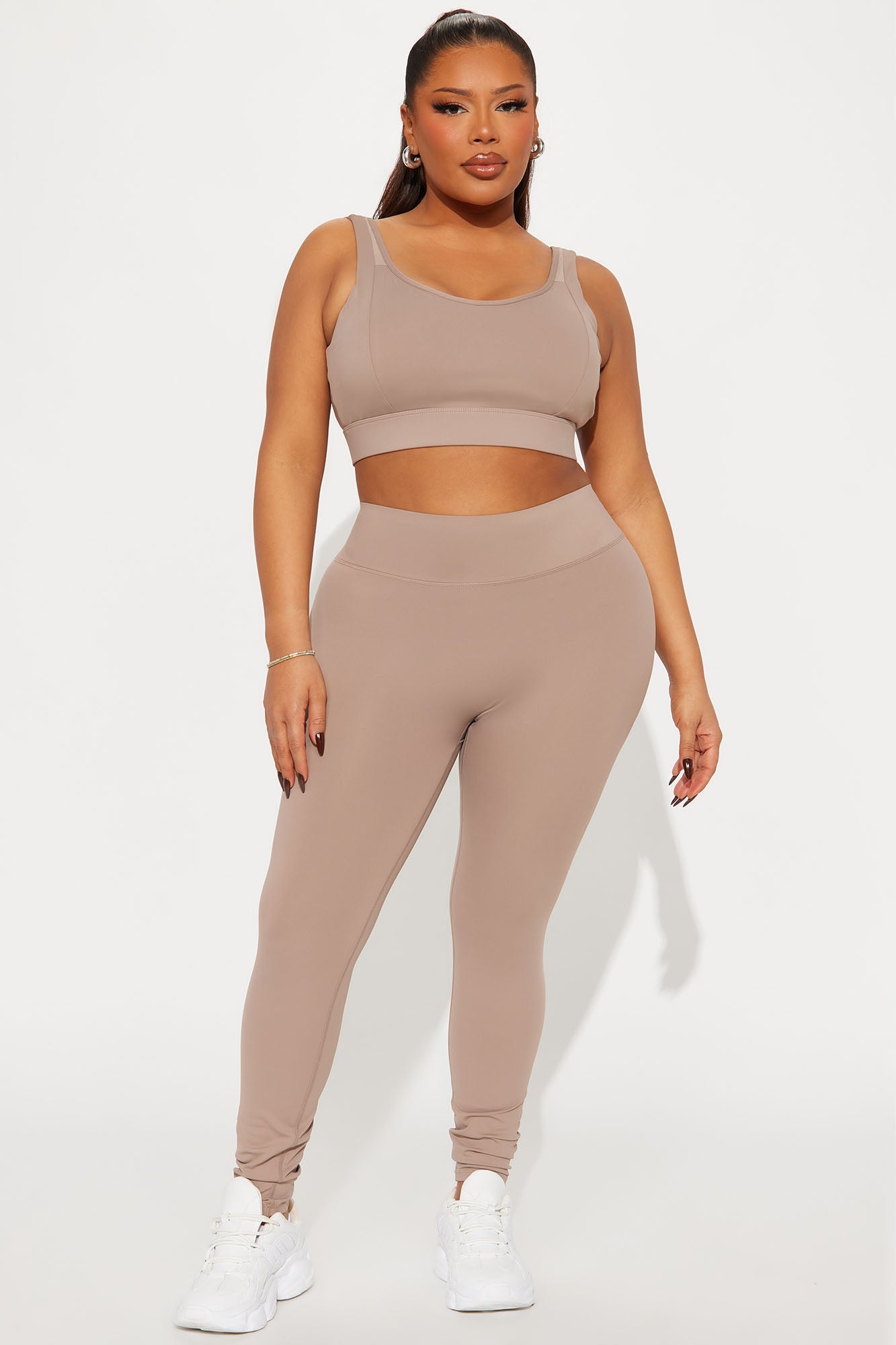Fashion Nova taupe active leggings for women paired with a matching crop top for a stylish workout look