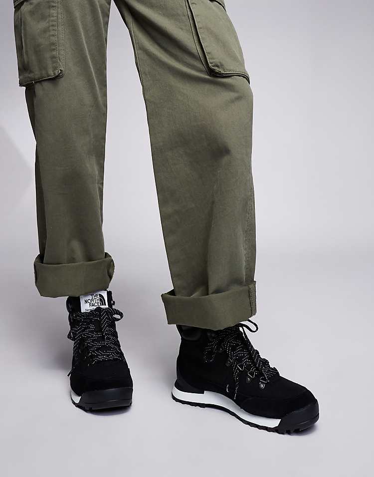 The North Face Back-To-Berkeley IV waterproof hiking boots paired with olive cargo pants for outdoor adventures
