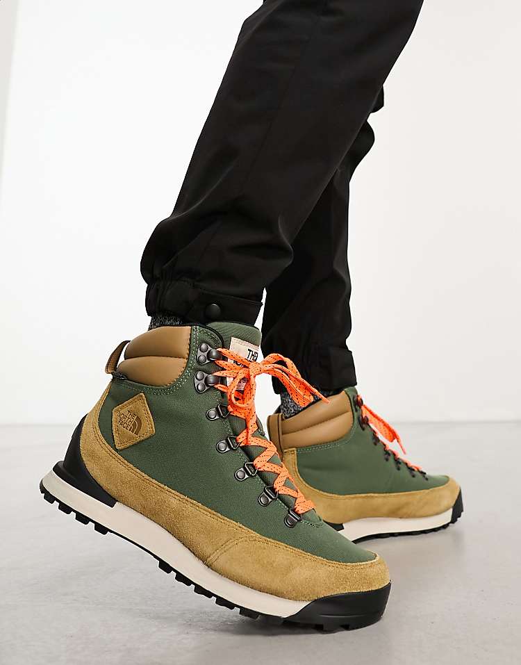 The North Face Back-To-Berkeley IV waterproof hiking boots worn with stylish outdoor pants.
