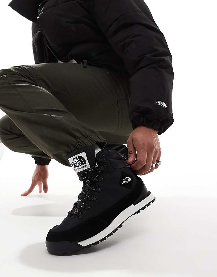 Man wearing The North Face Back-To-Berkeley IV waterproof hiking boots with stylish outdoor attire