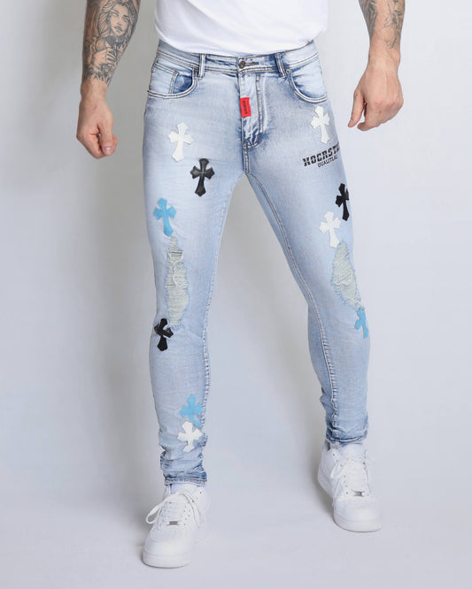 Logeqi trendy distressed jeans in light blue with colorful cross patches and a slim fit design