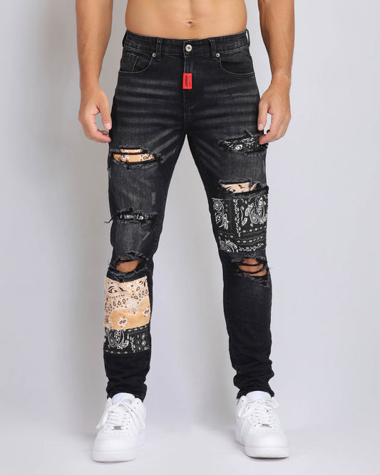 Trendy ripped black jeans from Logeqi featuring unique patchwork and distressed details