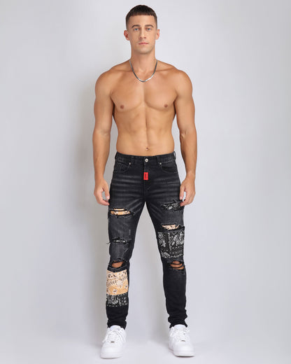 Trendy ripped black jeans for men featuring unique distressed details and a modern fit