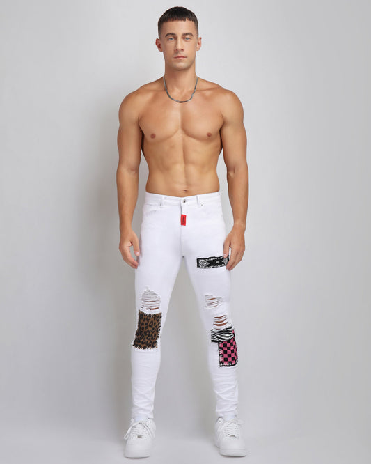 Logeqi trendy ripped white jeans featuring bold patchwork and a slim fit for a stylish look