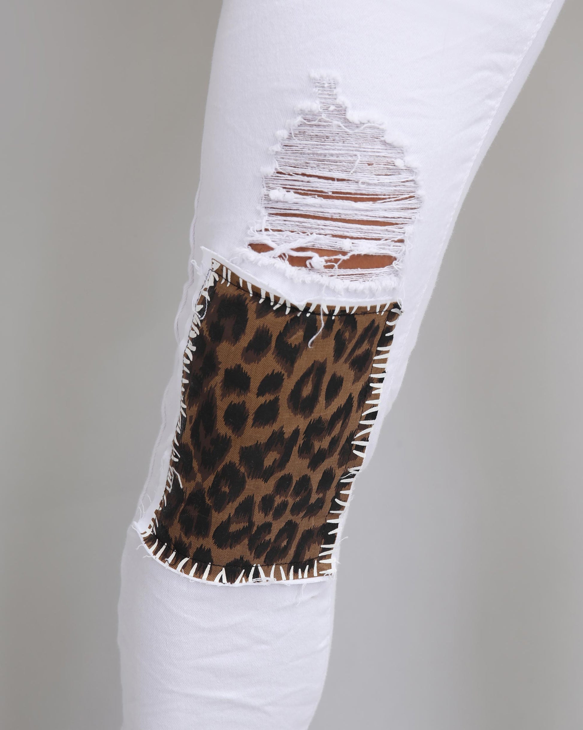 Logeqi trendy ripped white jeans with leopard patch detailing for a stylish look