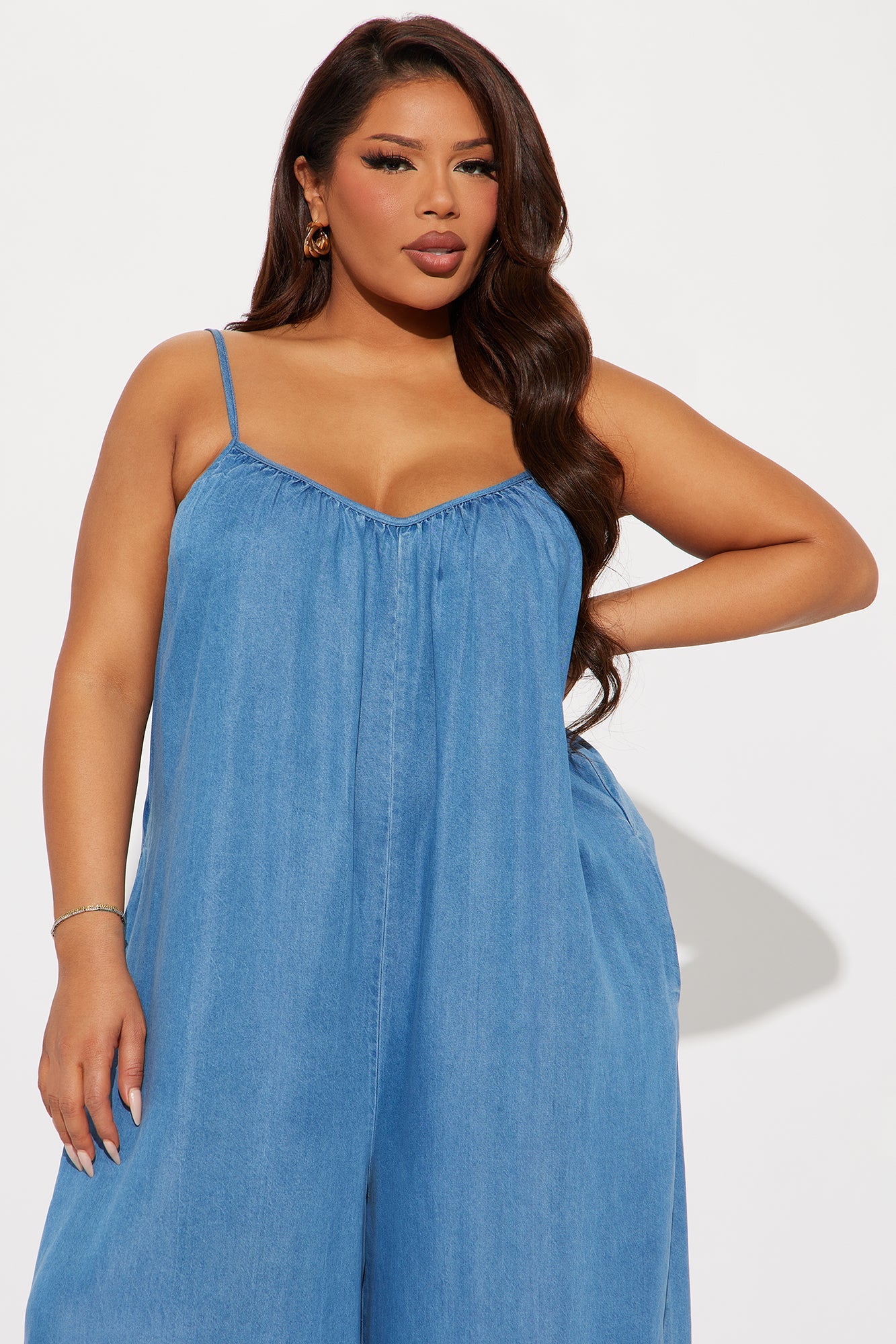 Fashion Nova chambray jumpsuit for women with spaghetti straps and loose fit
