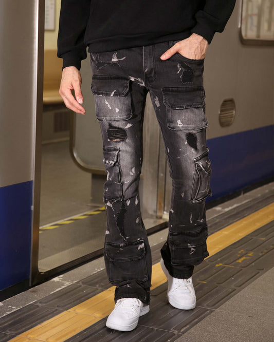 Logeqi distressed black cargo jeans with multiple pockets and ripped details worn with white sneakers