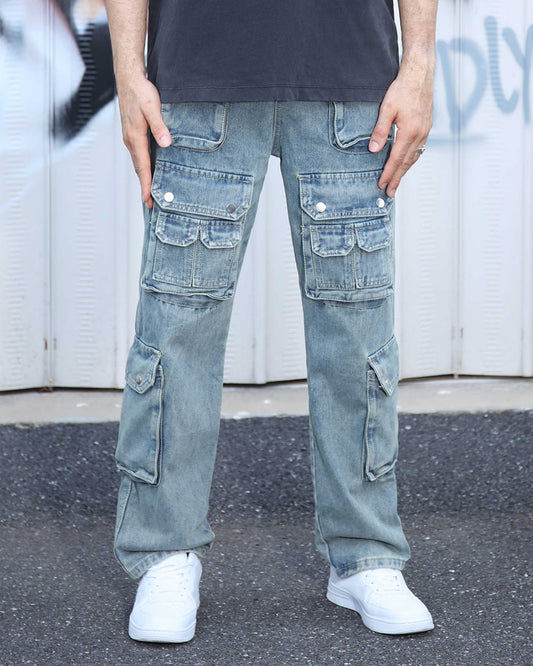 Logeqi distressed blue baggy jeans with multiple large pockets worn with white sneakers