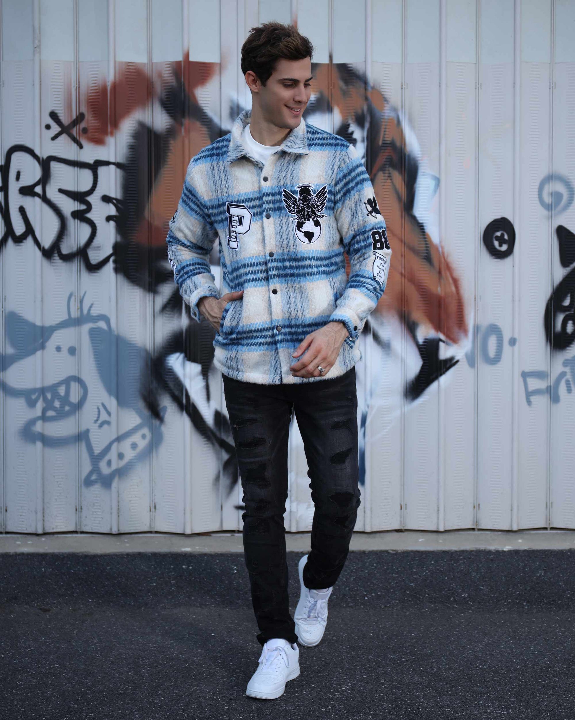 Logeqi insulated plaid moto jacket in blue and white worn by a man with black jeans and white sneakers