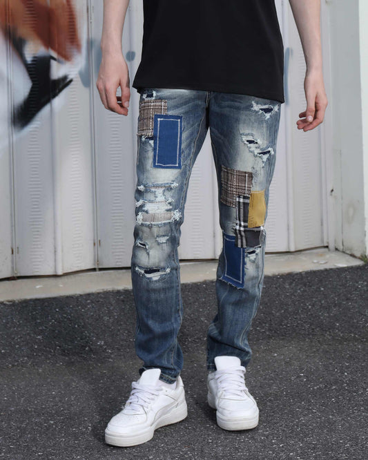 Logeqi irregular charm patchwork jeans with distressed details and multicolored patches