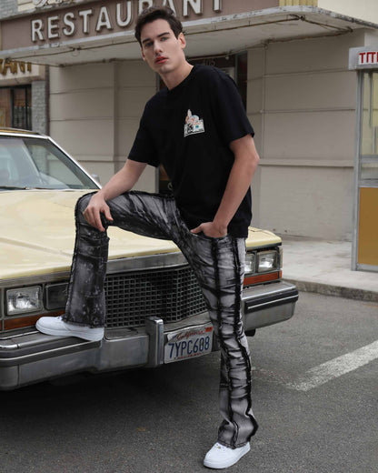 Logeqi vintage black jeans with a unique tie-dye pattern paired with a casual black t-shirt