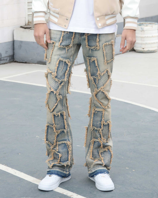 Logeqi vintage blue flared jeans with distressed detailing and unique patchwork design