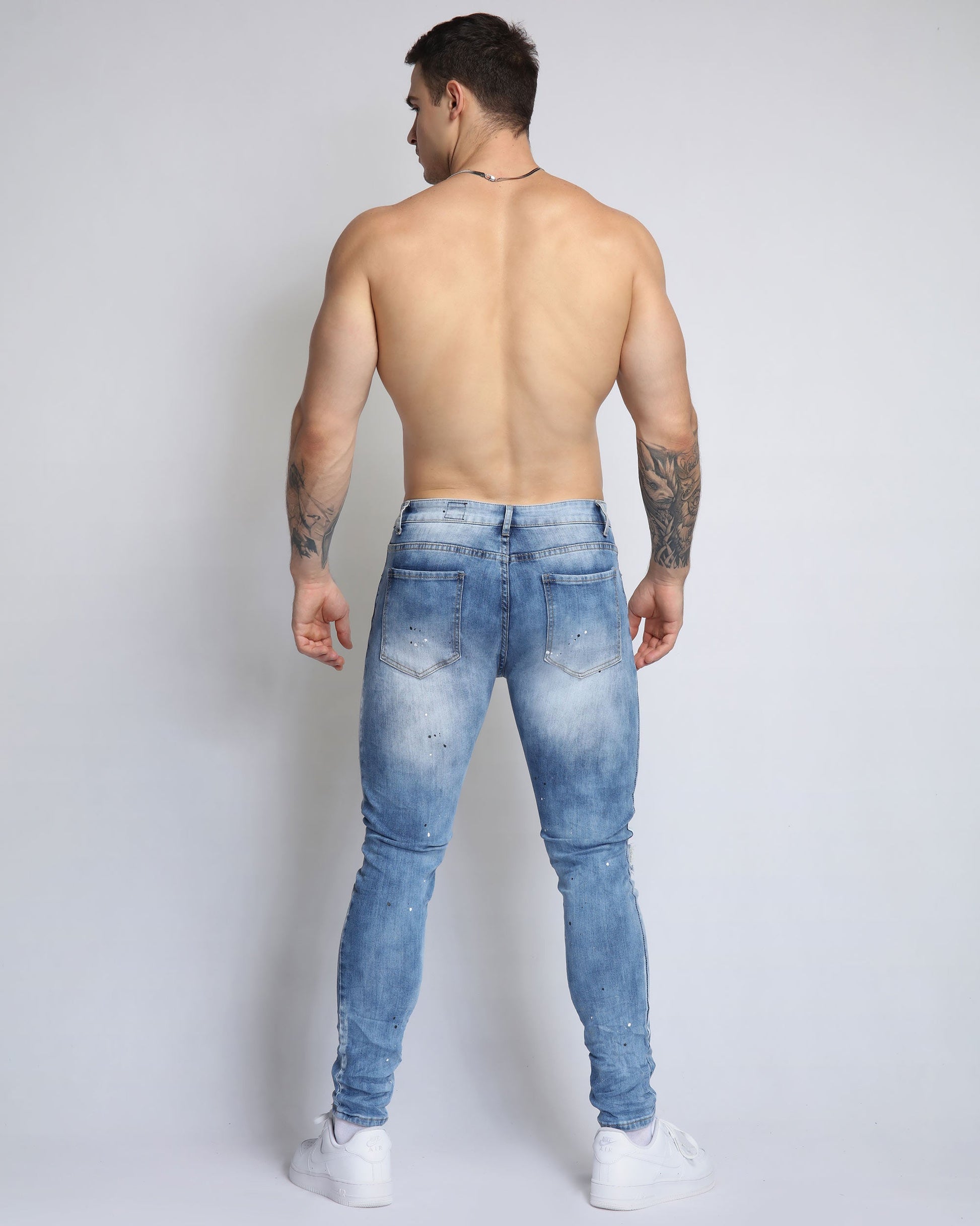 Logeqi vintage ripped denim jeans in light blue with a slim fit for a trendy look