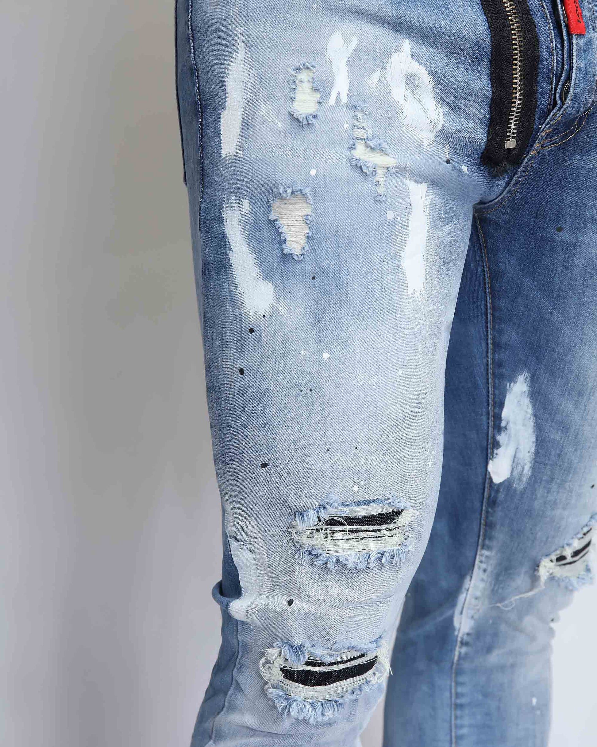 Logeqi vintage ripped denim jeans featuring distressed details and a slim fit design