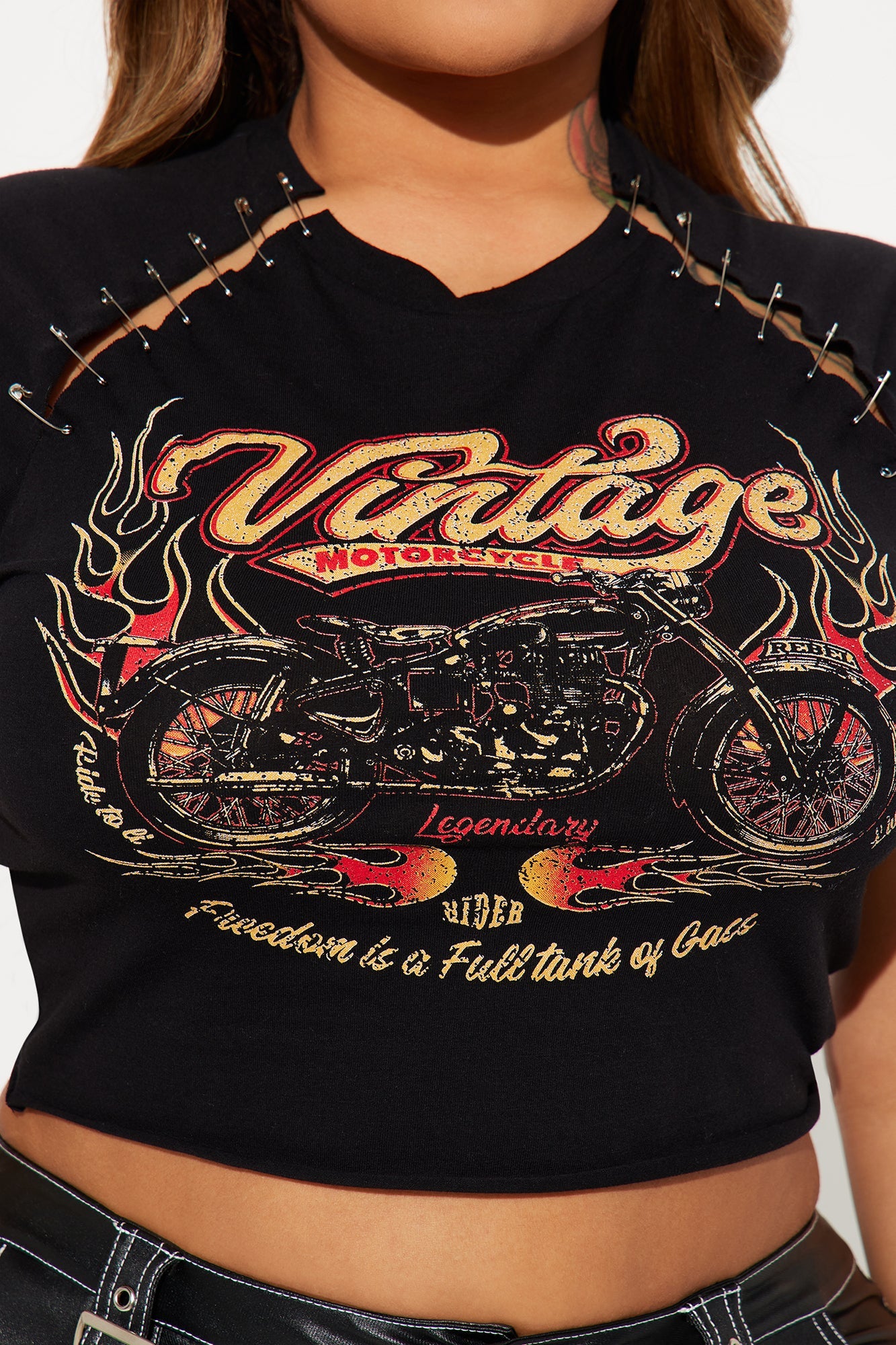 Vintage rock t shirt women featuring a graphic motorcycle design and stylish cut-out details