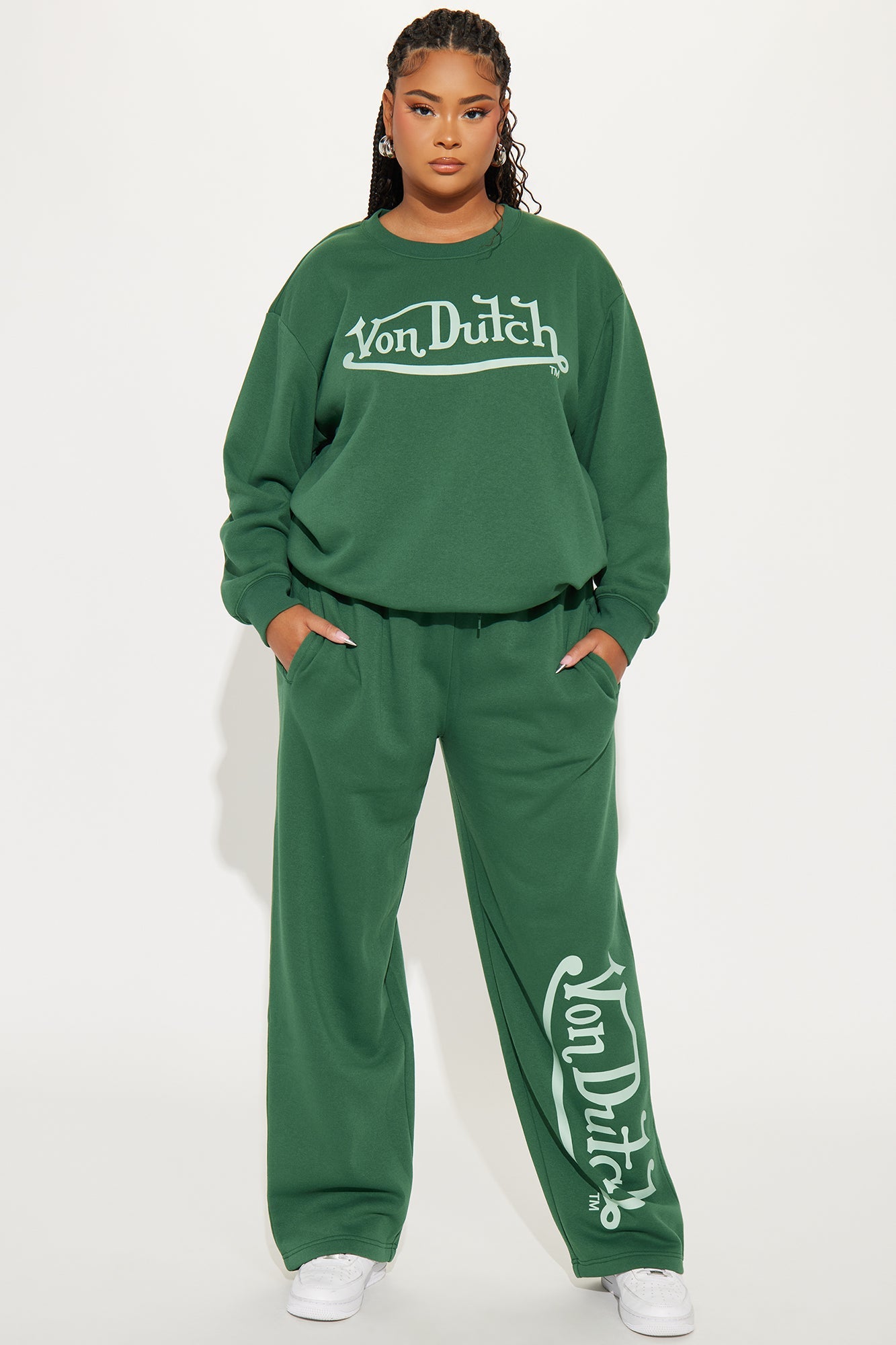 Von Dutch distressed crewneck sweatshirt in green paired with matching pants for a stylish casual look