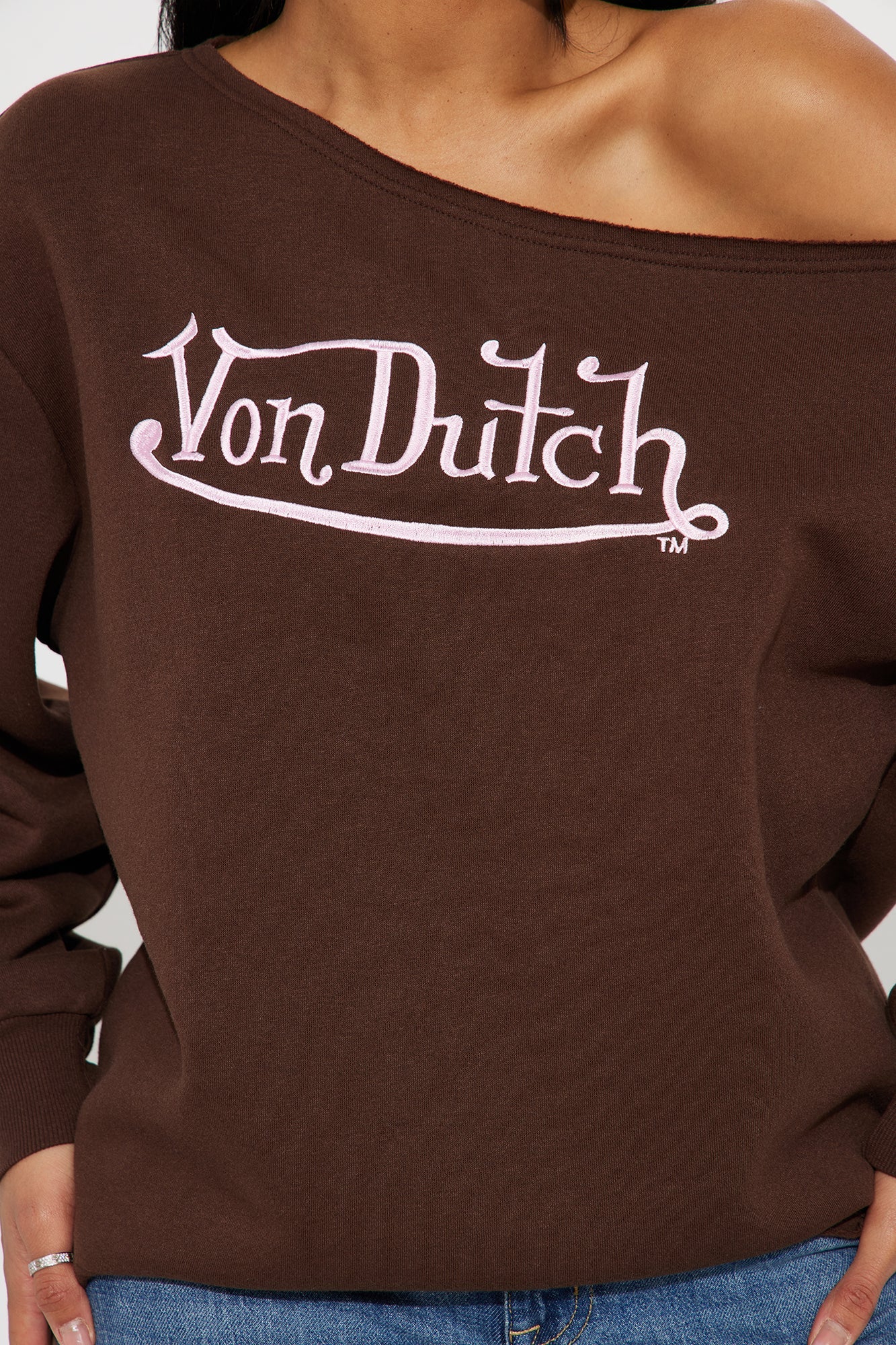 Von Dutch off shoulder sweatshirt in brown with stylish logo, perfect for casual outings.