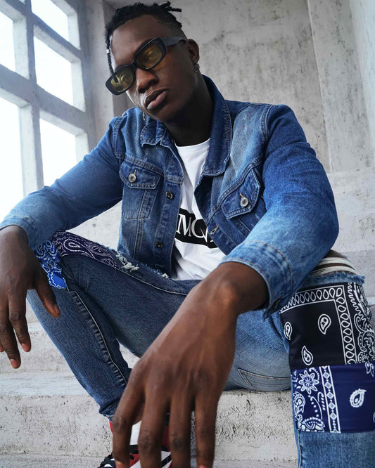 Logeqi washed blue denim jacket worn by a model for a trendy casual look