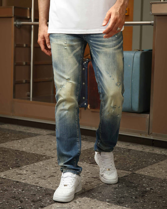 Logeqi whiskered distressed jeans with a relaxed fit and subtle fade for a stylish casual look