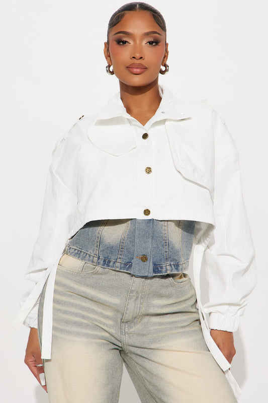 Fashion Nova white cropped trench coat featuring a stylish design and button details